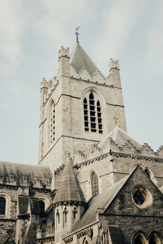 a large stone building with a clock on it's tower