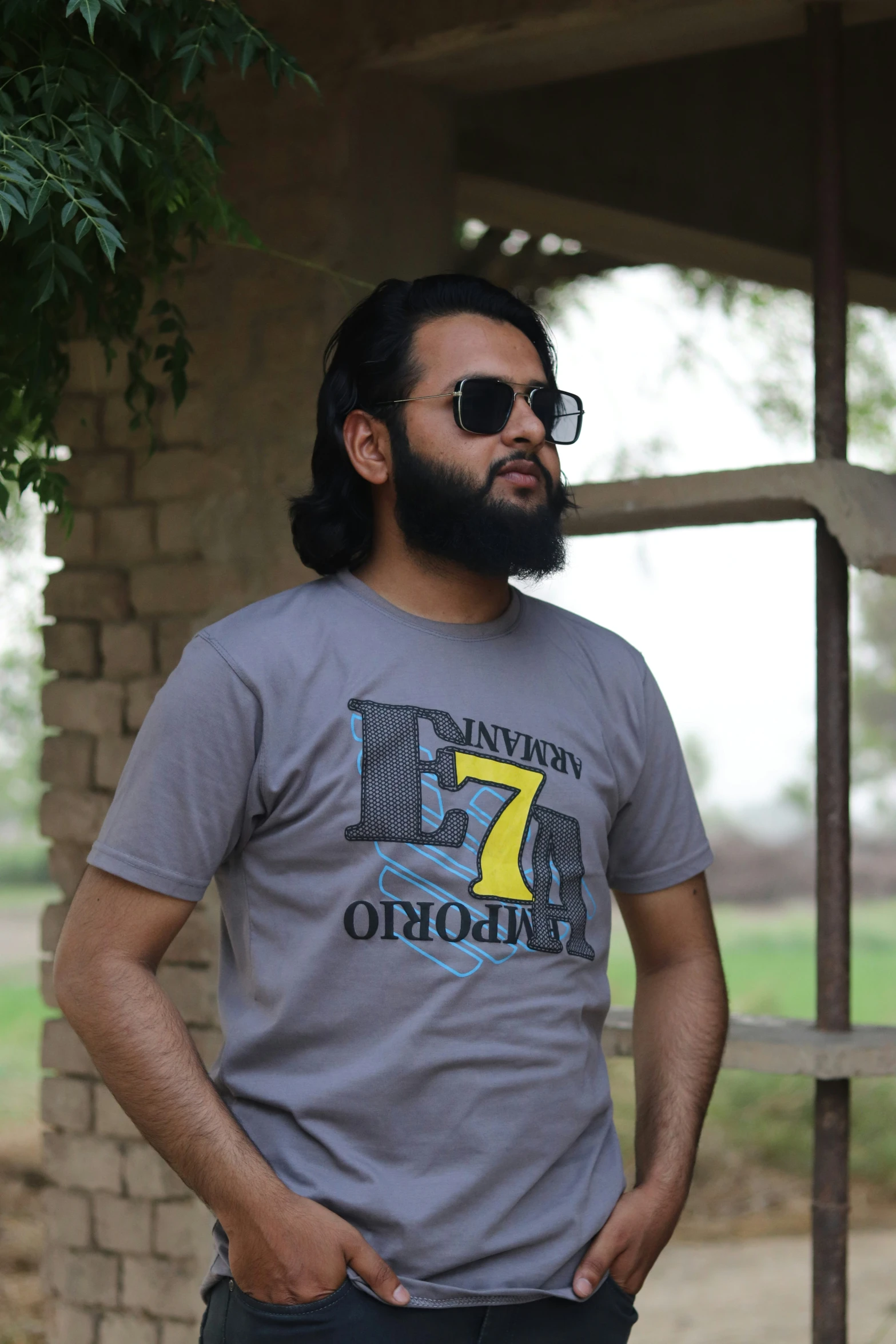 a man with a beard wearing a t - shirt