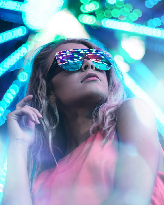 a young woman in glasses looking upward