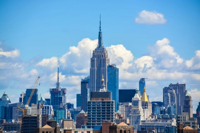 a city skyline with skyscrs and other high rises