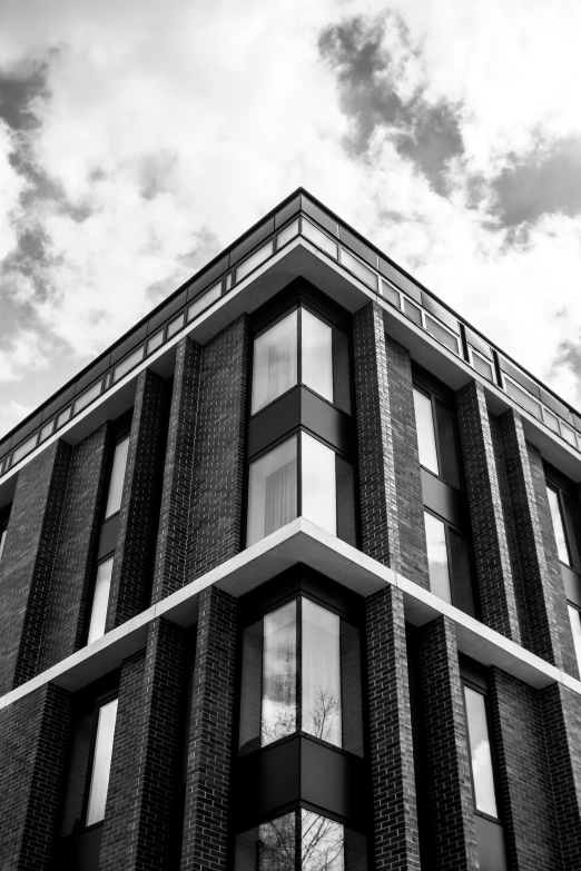 the corner of a building with lots of windows