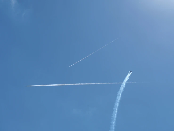 the contrail in the sky appears to be shooting up