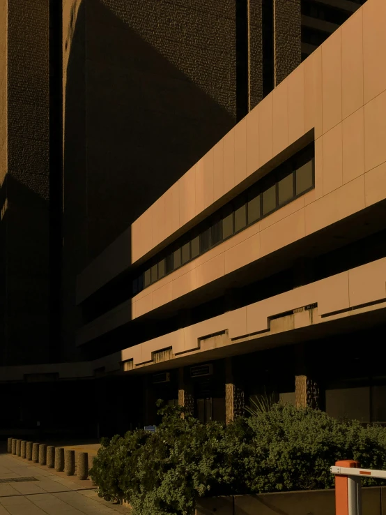 a po of a parking garage in front of an office building