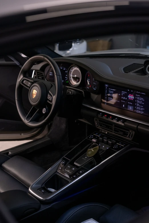 a close up of the dashboard and display of the interior of a car