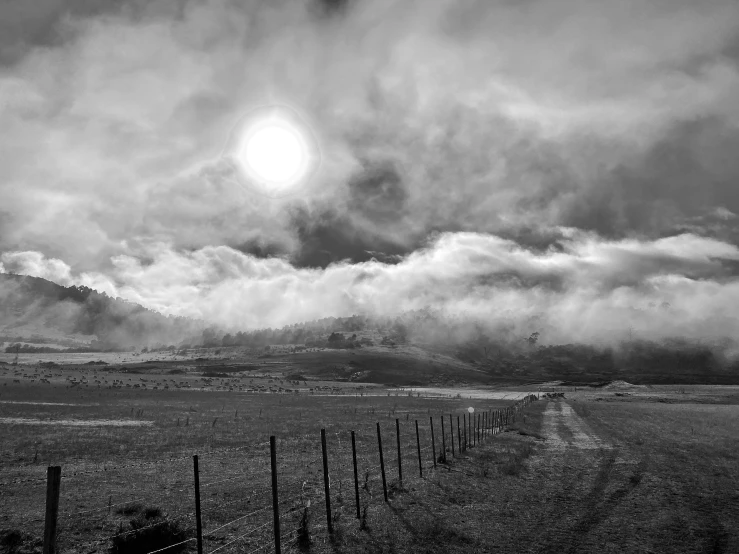 the landscape is covered in thick clouds and sun