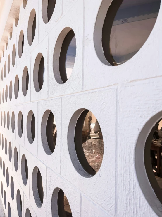 several holes that have been placed on a wall