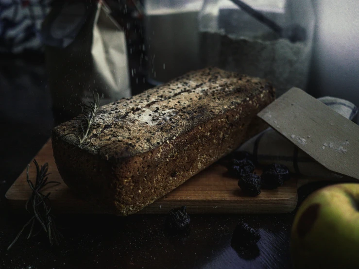 a loaf of bread sitting on top of a  board