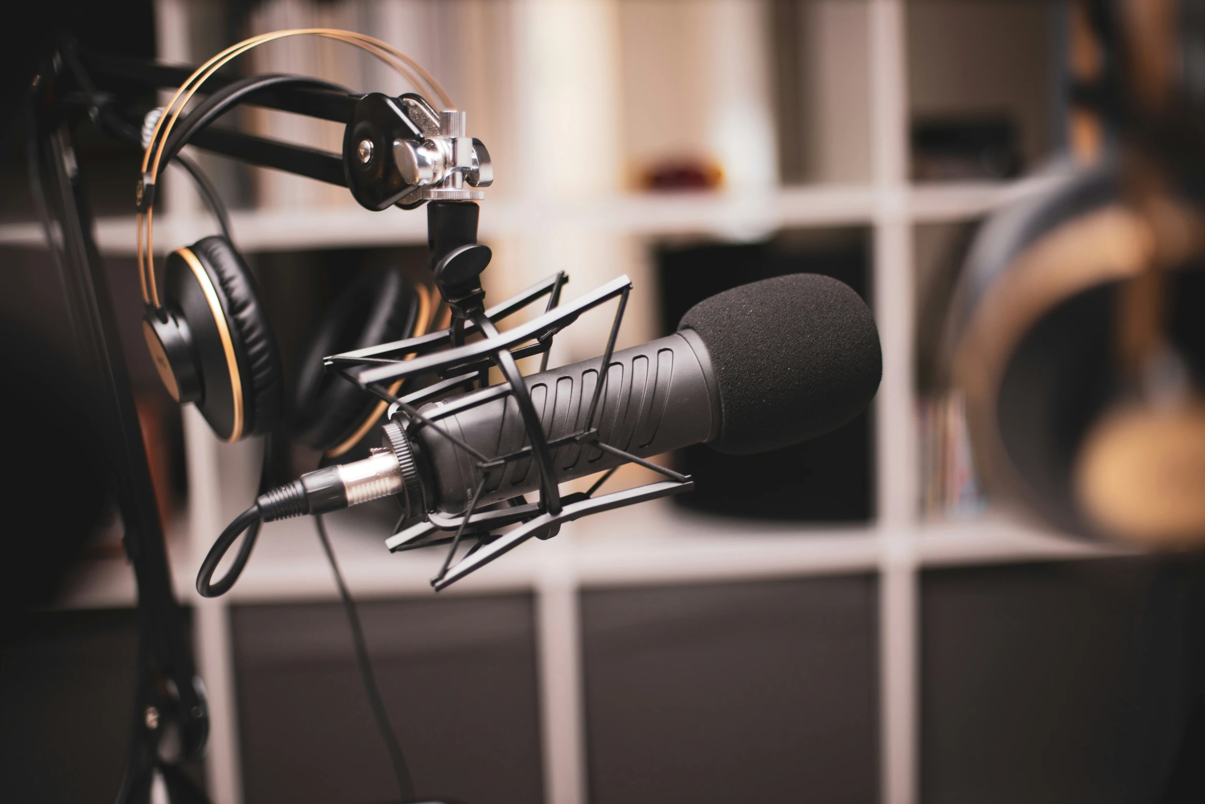 a microphone sitting next to a white tiled wall