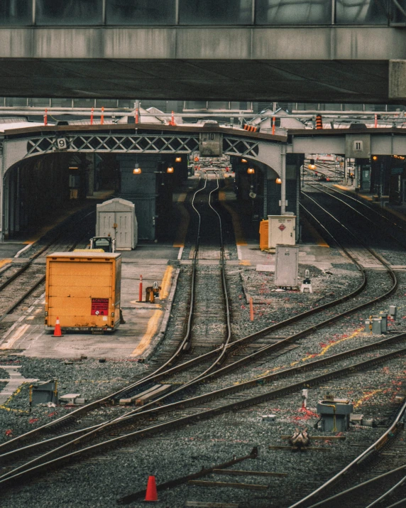 railroad tracks and buildings in the distance