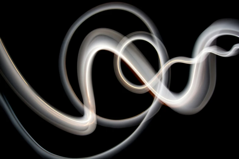 blurry po of swirls in a black background