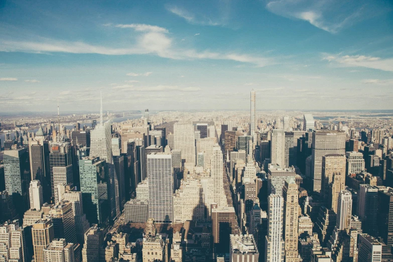 the cityscape of new york city in the day