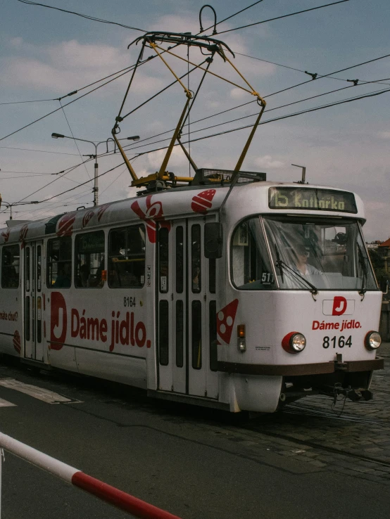 the tram has two overhead rails above it