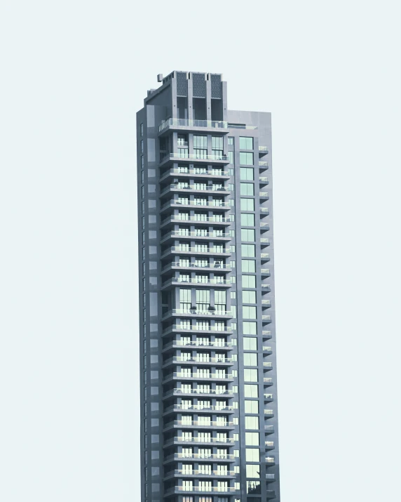 a tall building sitting in the sky above buildings