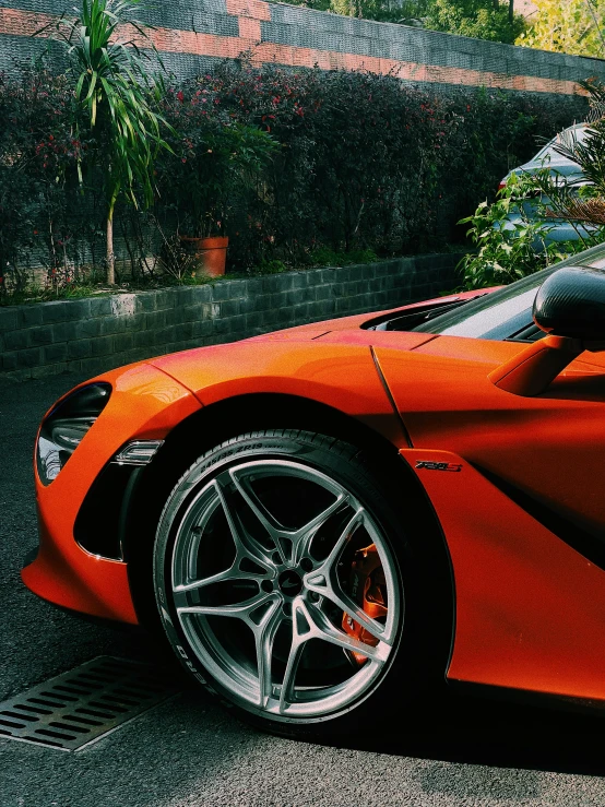 a close up view of the tire and tires on a sports car