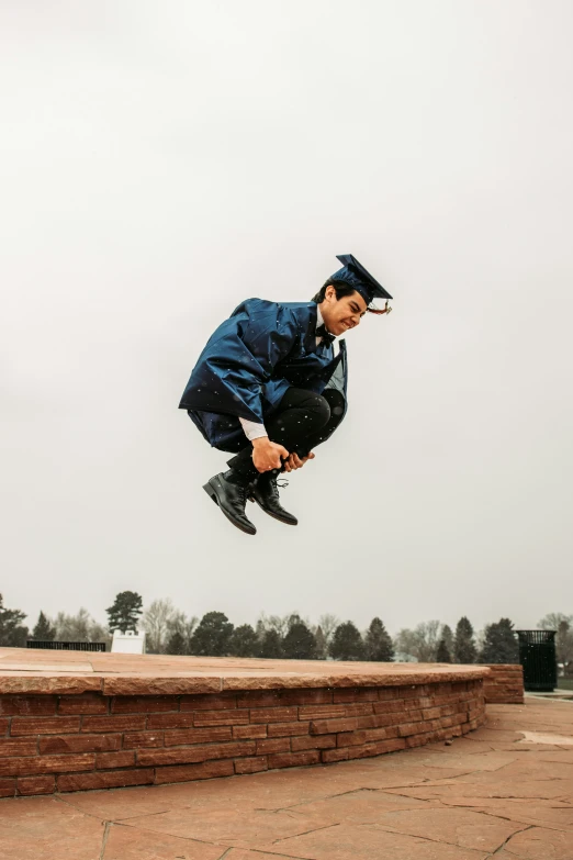 a skateboarder is mid air, doing a trick