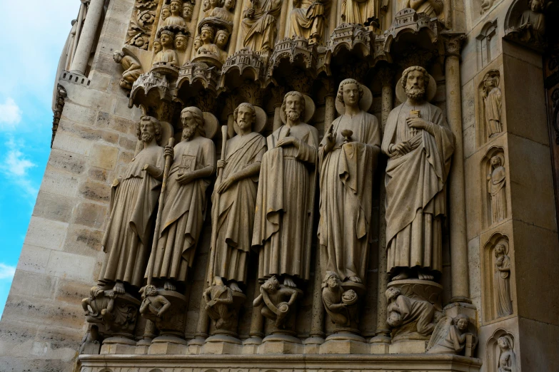 a statue on the side of a building