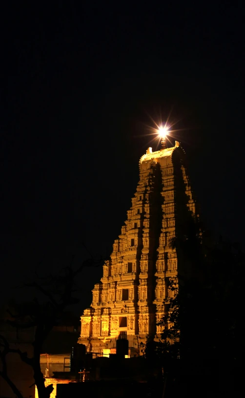 a tall tower lit up at night