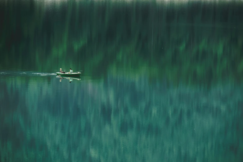 a green painting of two boats in the water