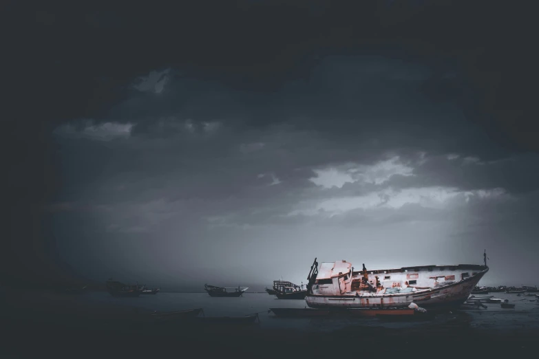 the boat is moored in the stormy water