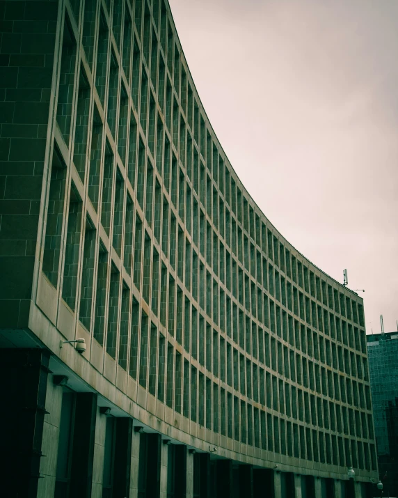 a close up po of a building with a tall circular design