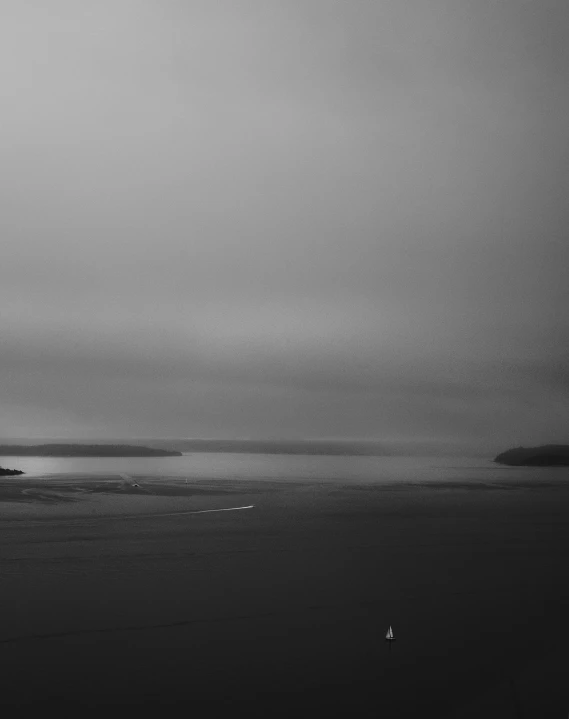 dark sea with white sailboat in ocean during daytime