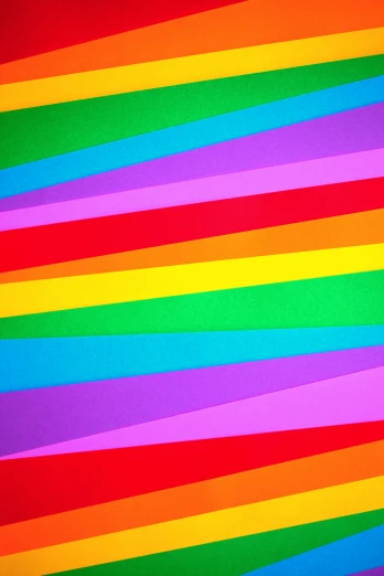 a rainbow striped background with lots of colors