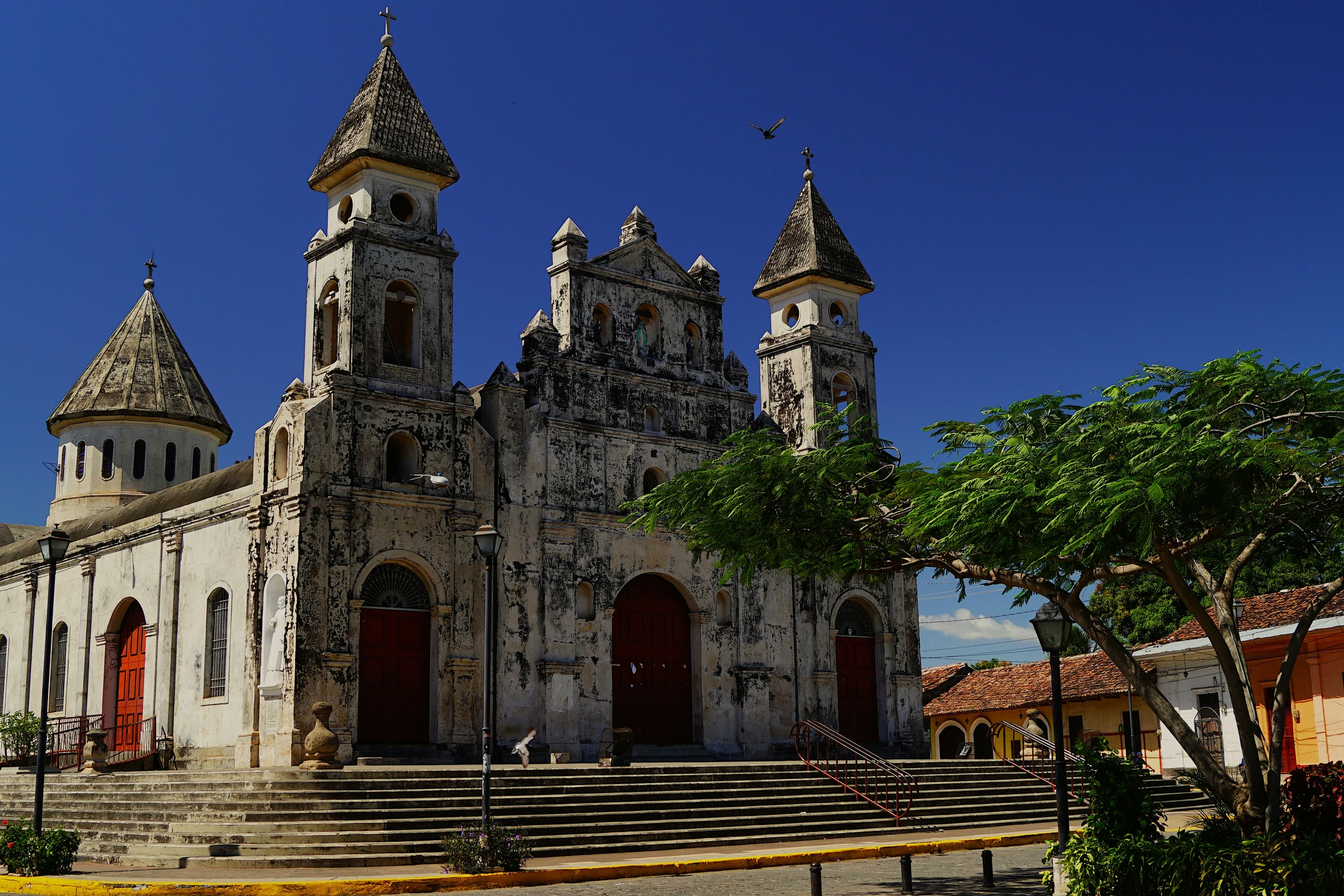 an old building with several steeples and two sides of it