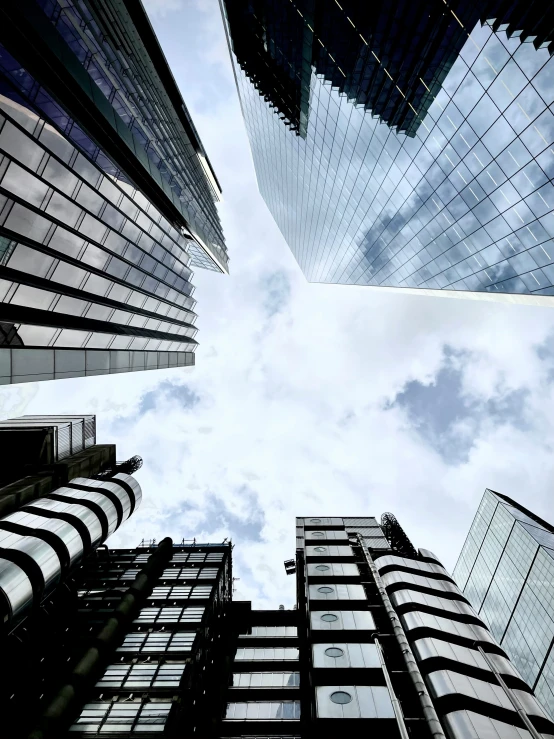 a picture taken from the bottom looking up into the buildings