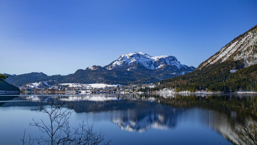 a snowy mountain range is shown in the distance