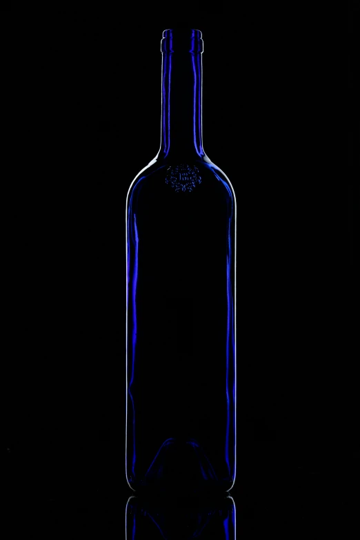 the wine bottle is black and empty