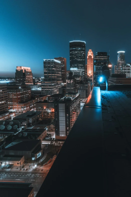 the view from a high rise looking down at a city