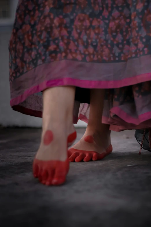 this is a picture of the red feet on a woman wearing slippers
