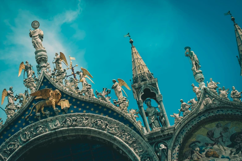 ornate architecture stands beneath a sunny blue sky