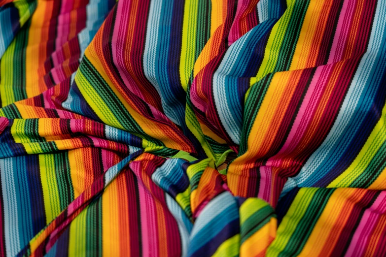 a picture of some colorful striped fabrics