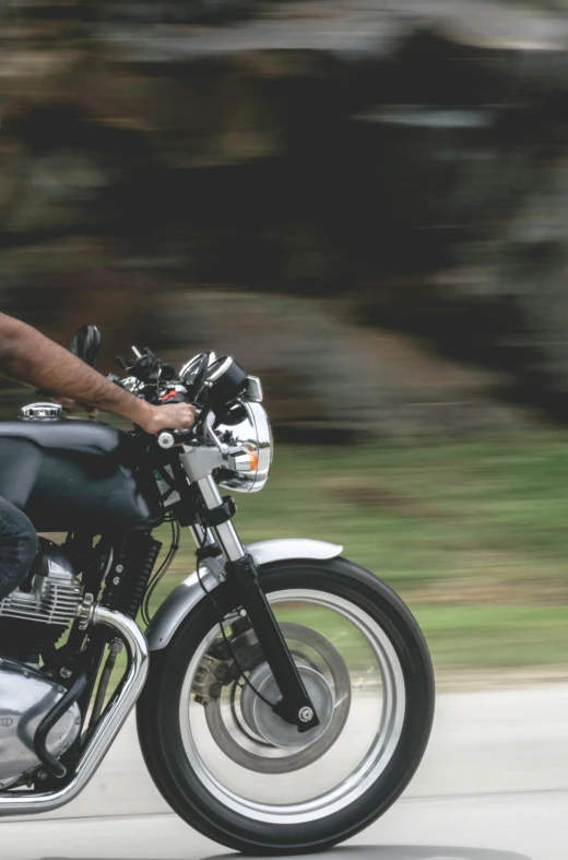 a man rides on his motorcycle as he travels