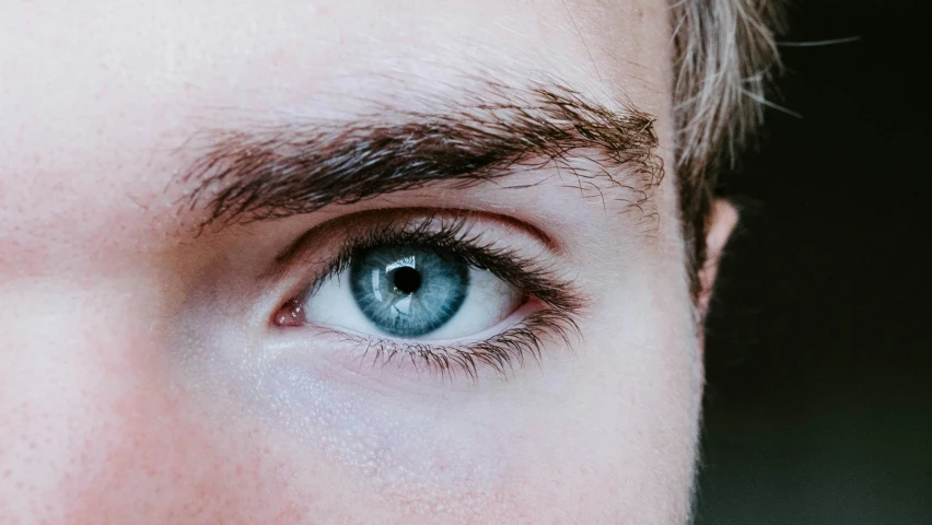 an image of a man with a blue eye