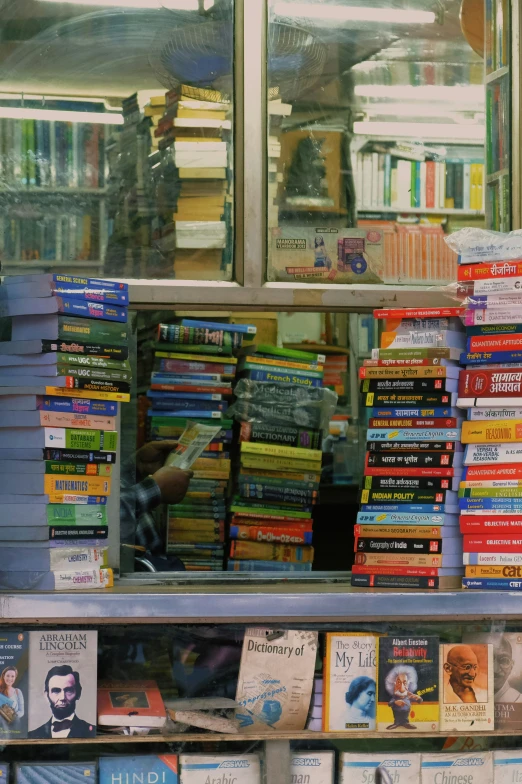 a display of books behind a glass