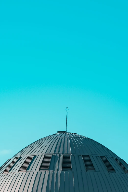 a po of the top of a building, with a sky background