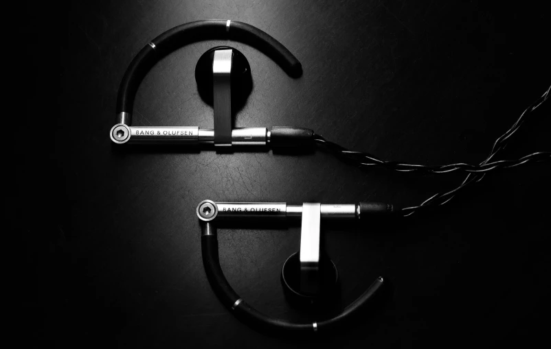 a pair of headphones is displayed in the dark