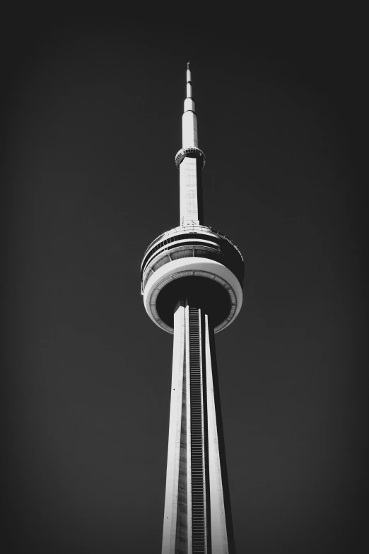 the space needle, which is part of the world's tallest observation tower, stands tall in black and white