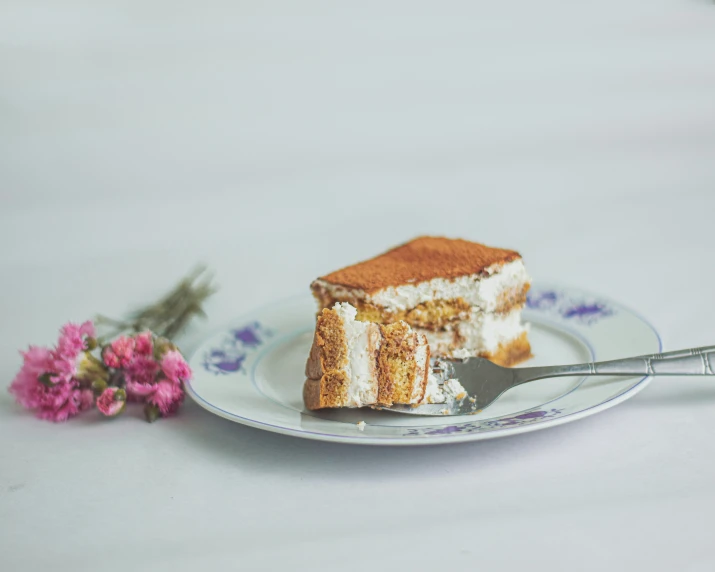 a piece of cake that is on a plate with a fork