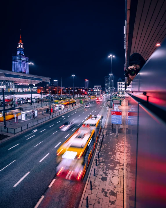 a view of the roadway at night from outside a building