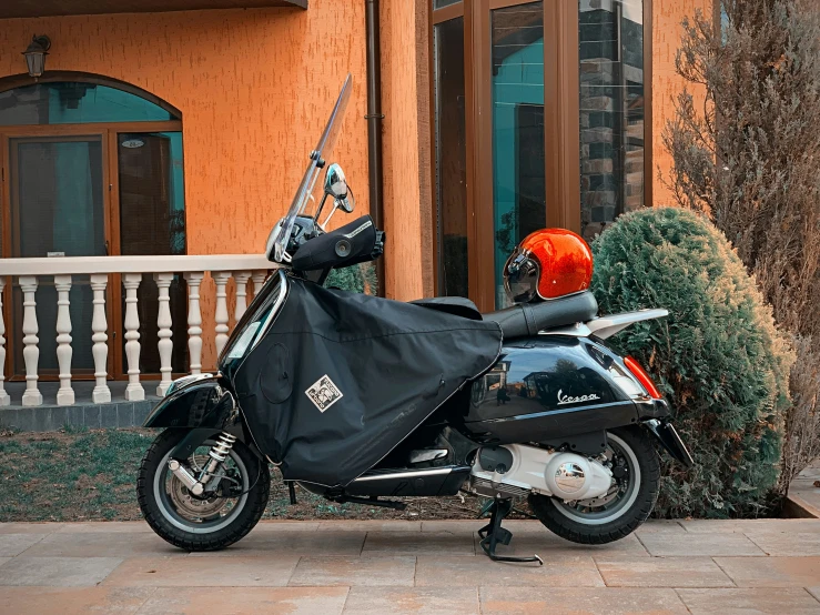 a scooter is shown wearing a helmet on its head