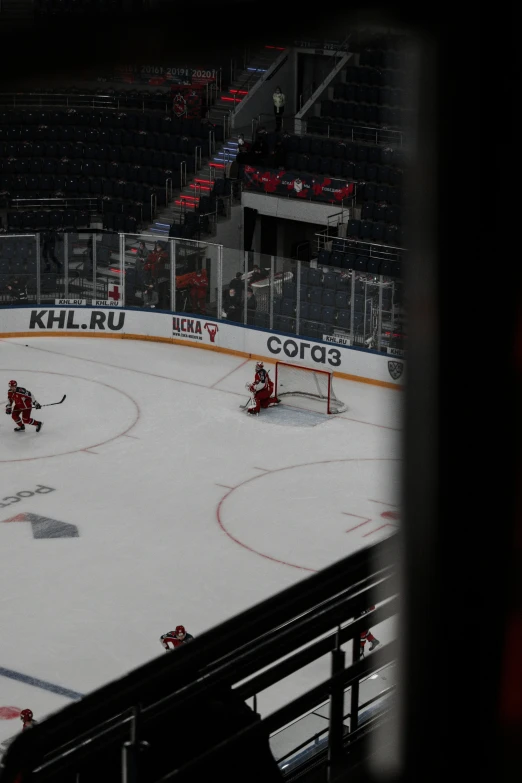 the hockey game is being played with a few players