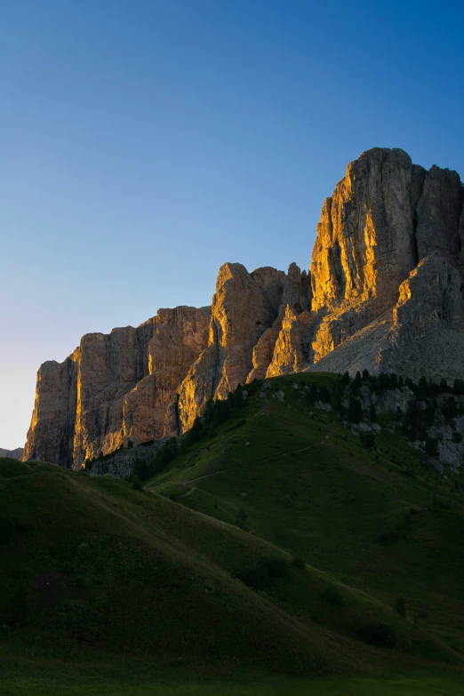 a landscape po with a mountain range in the background