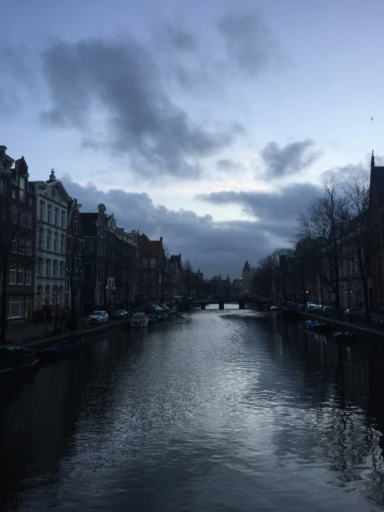 a view of the water and buildings in a city