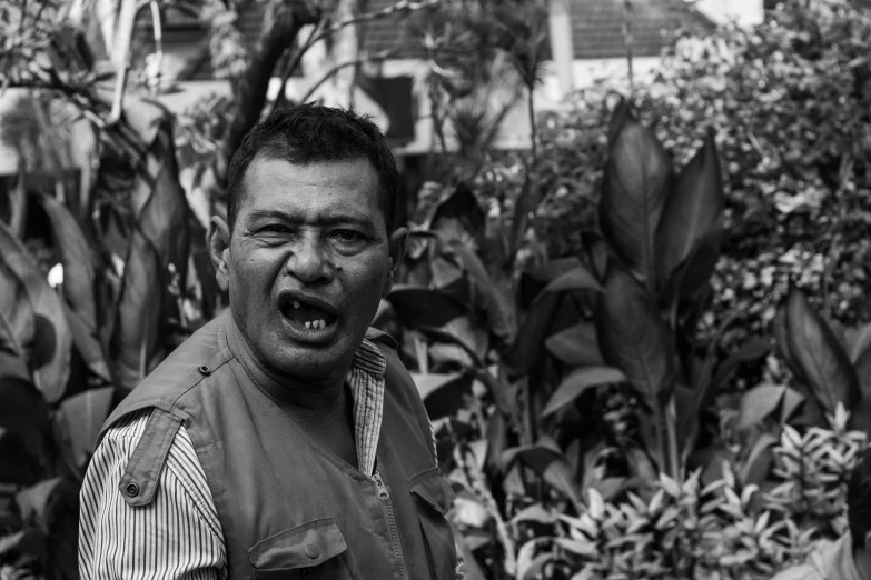 a man with an intense facial expression has a tooth full of teeth