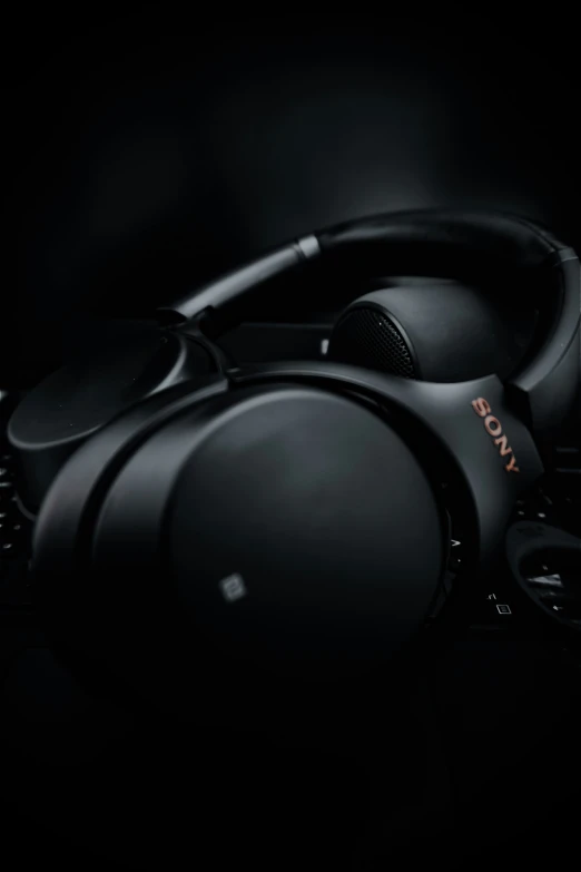 headphones on black background with lighting from above