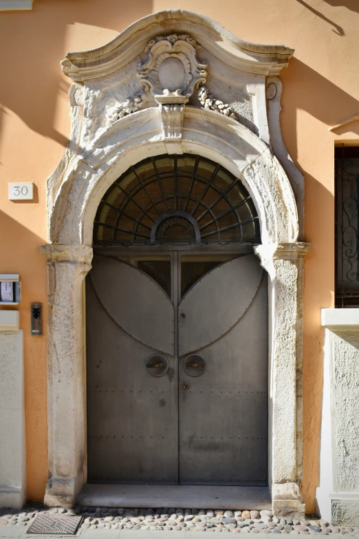 an arched doorway to the outside of a building