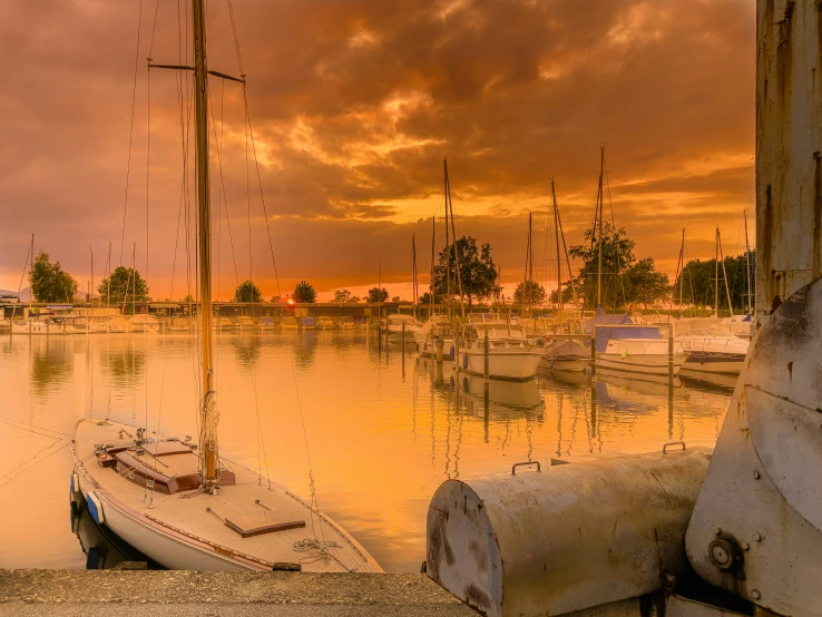 a boat on the water in the middle of a marina